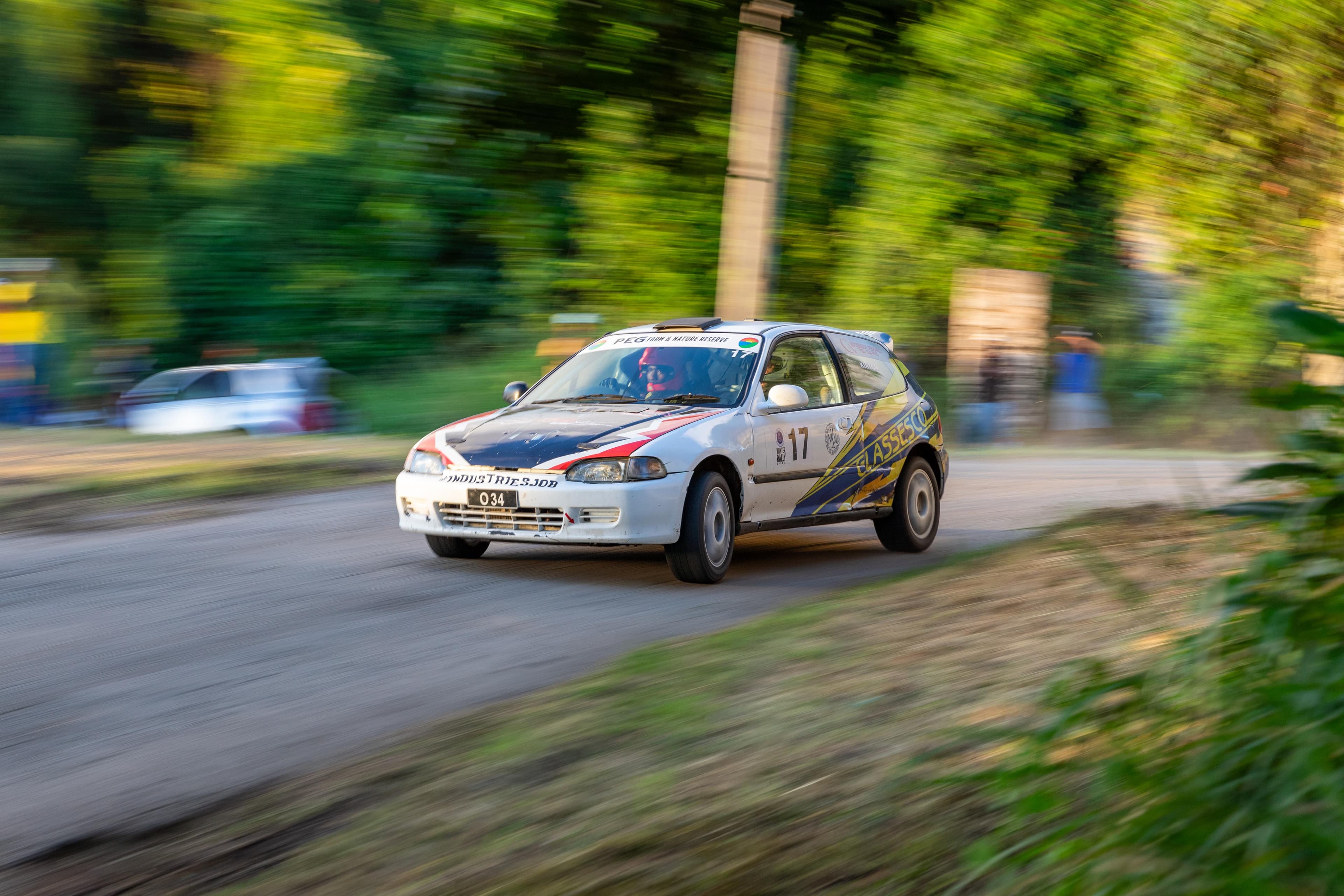 GT race cars crossing the finish line