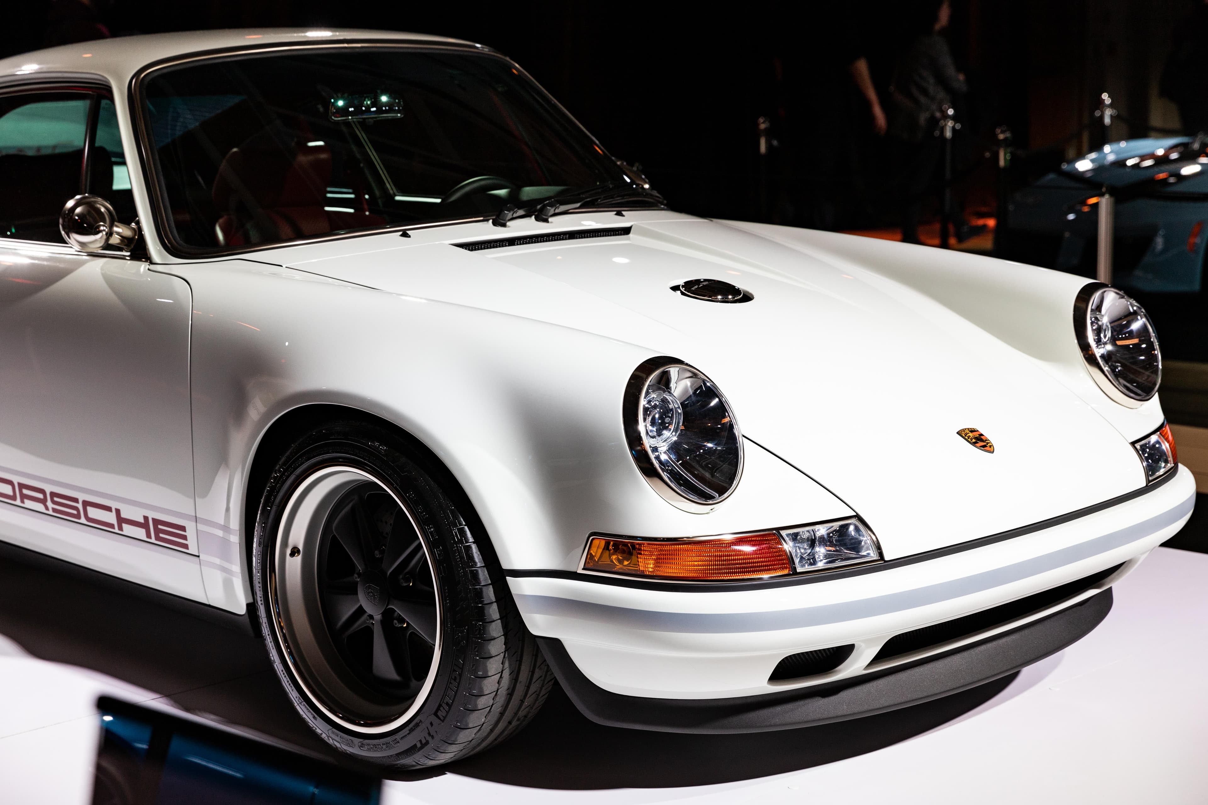 Drift car sideways with massive tire smoke at night event