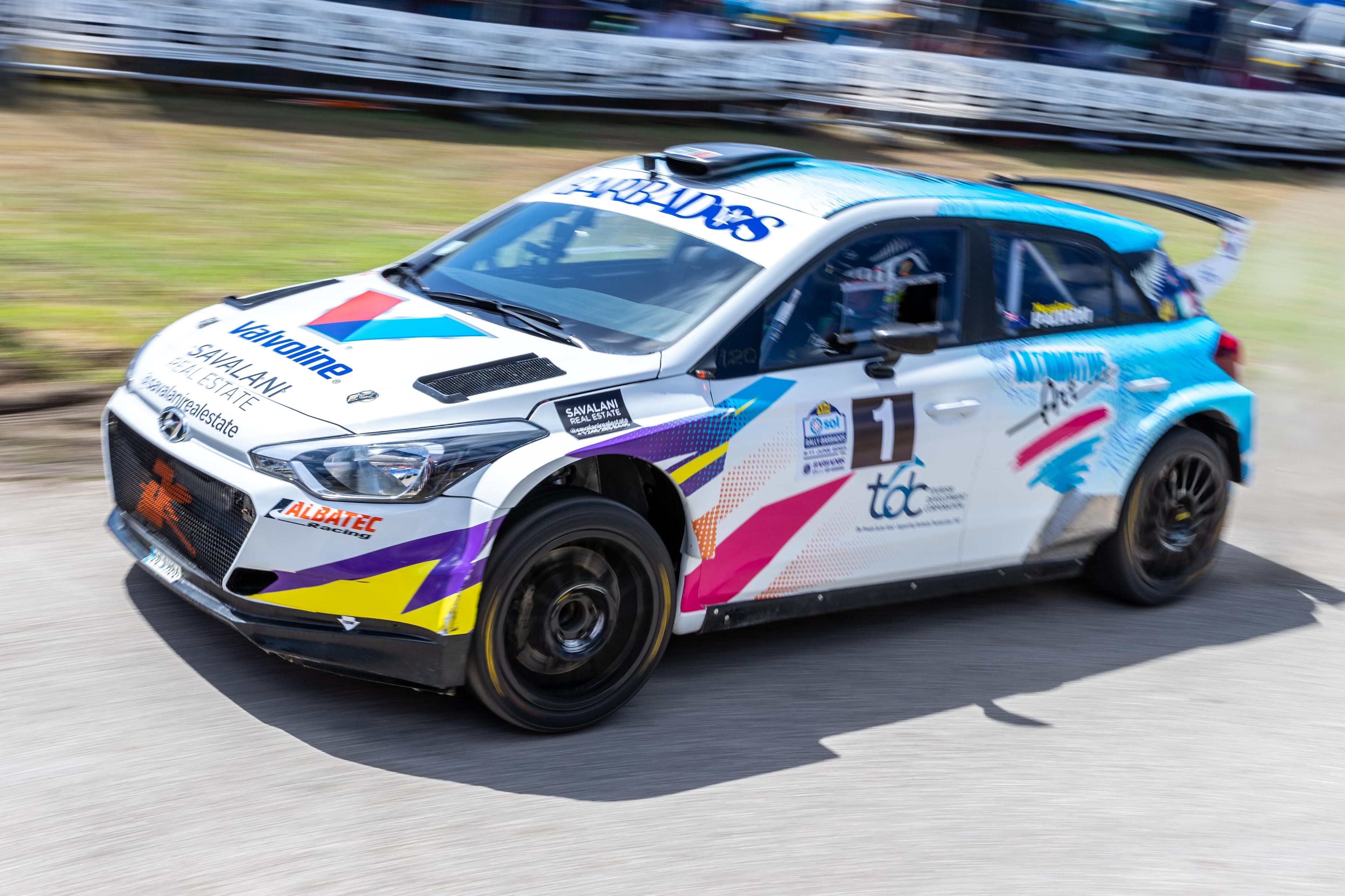 Row of classic muscle cars on display